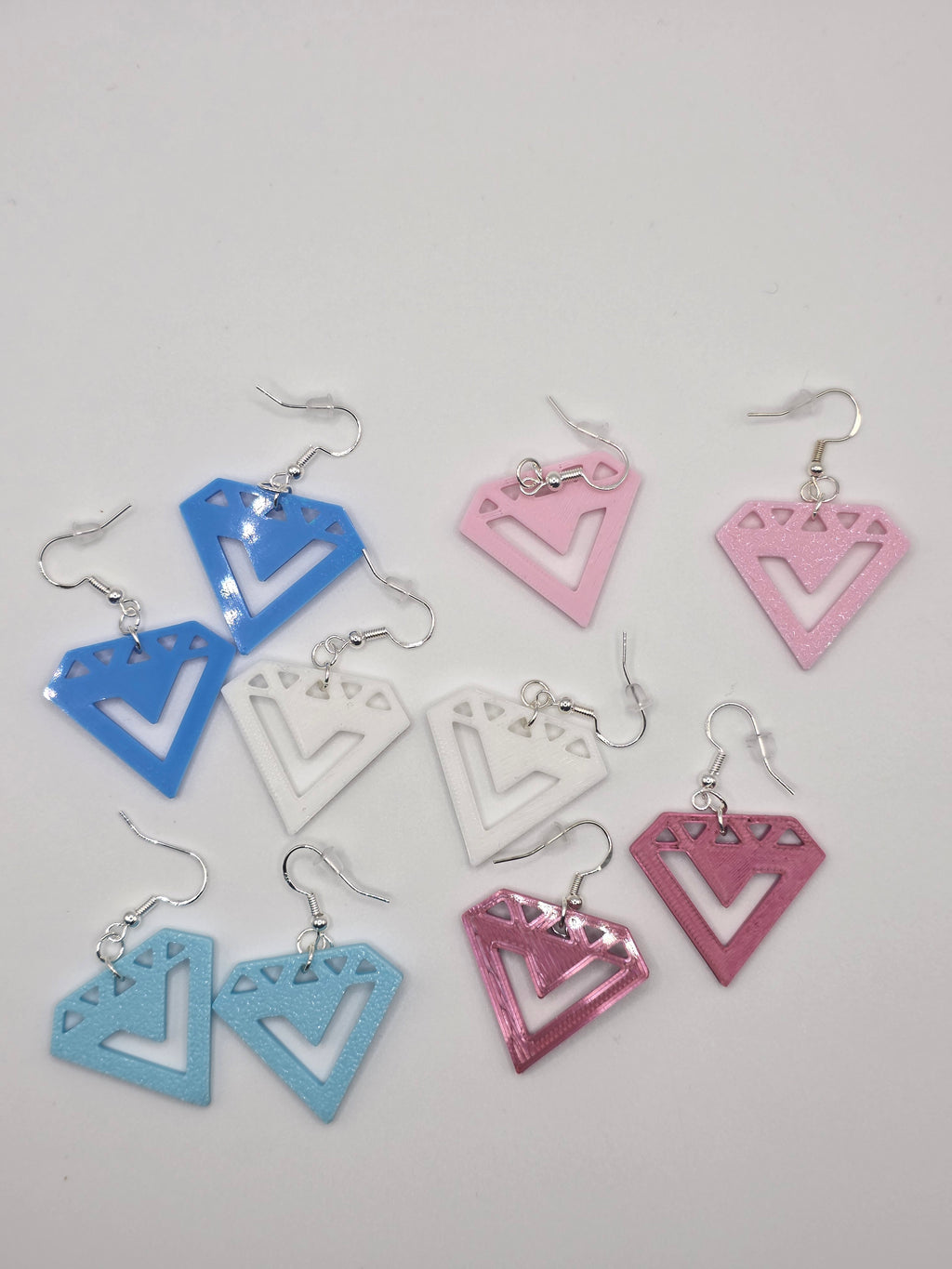 Seventeen diamond 3D Printed earrings